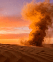 沙漠夕阳下沙尘扬起景象3585#横屏 