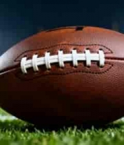  橄榄球置于绿茵场特写3019#横屏 	 