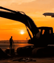 机场夕阳下挖掘机与飞机画面531#横屏 