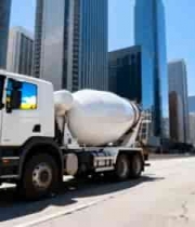  城市道路上行驶的混凝土搅拌卡车650#横屏 	 
