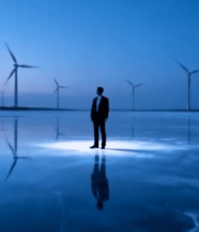 男子于冰面站立风车背景12194#横屏 