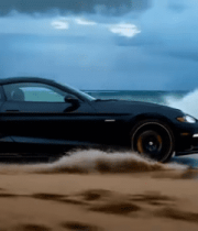 黑色跑车在海边行驶12598#横屏 
