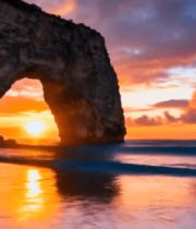 海边日落时的天然石拱门景观11726#横屏 