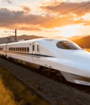 夕阳下高铁穿行金黄稻田7945#横屏 