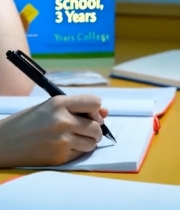  女学生伏案书写神情略显疲惫2317#竖屏 	 