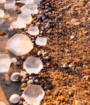  海滩上的冰块与落日景象318#竖屏 	 