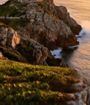  海边悬崖上的灯塔日落景象5849#竖屏 	 