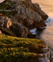  海边悬崖上的灯塔日落景象5849#竖屏 	 