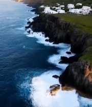  海岸边山坡白色房屋航拍339#竖屏 	 